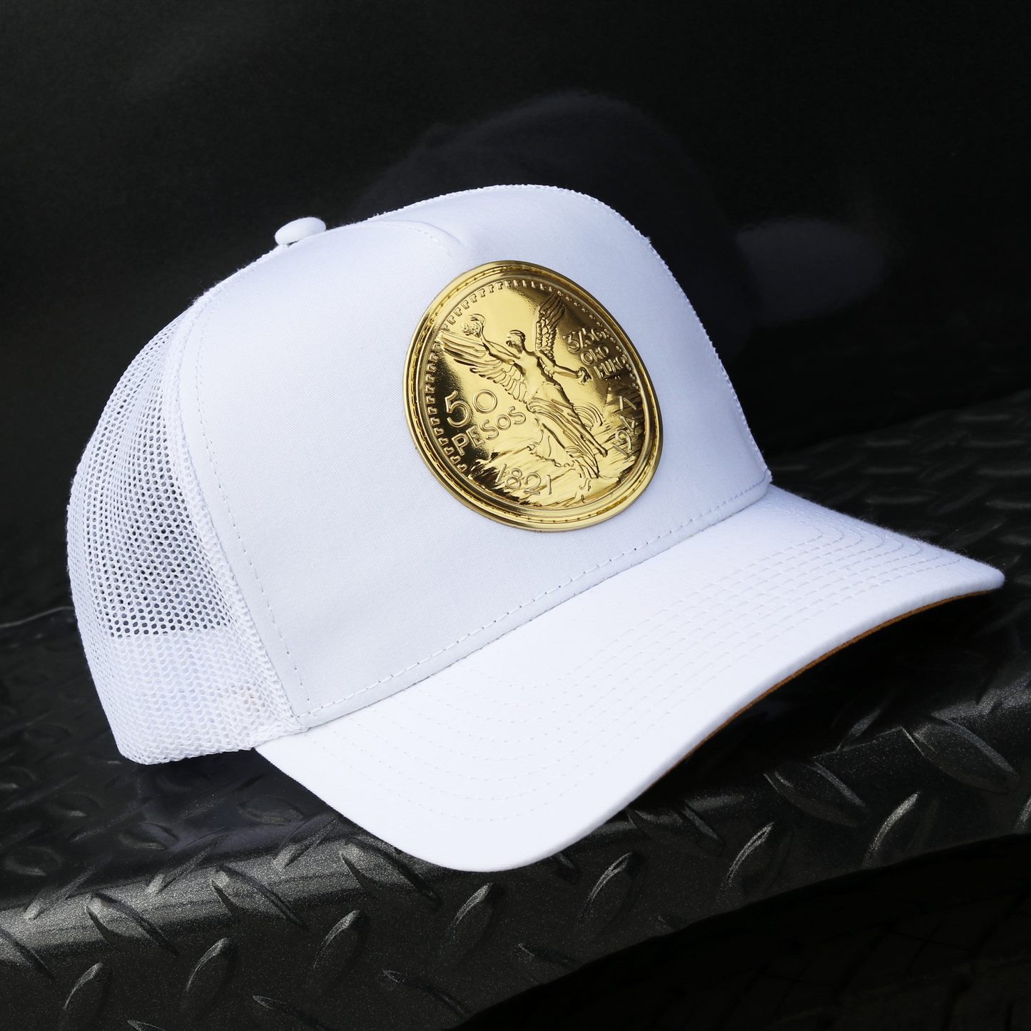 White El Cente AVC hat with white mesh, pre-curved visor, and a prominent gold 50 Pesos coin emblem.