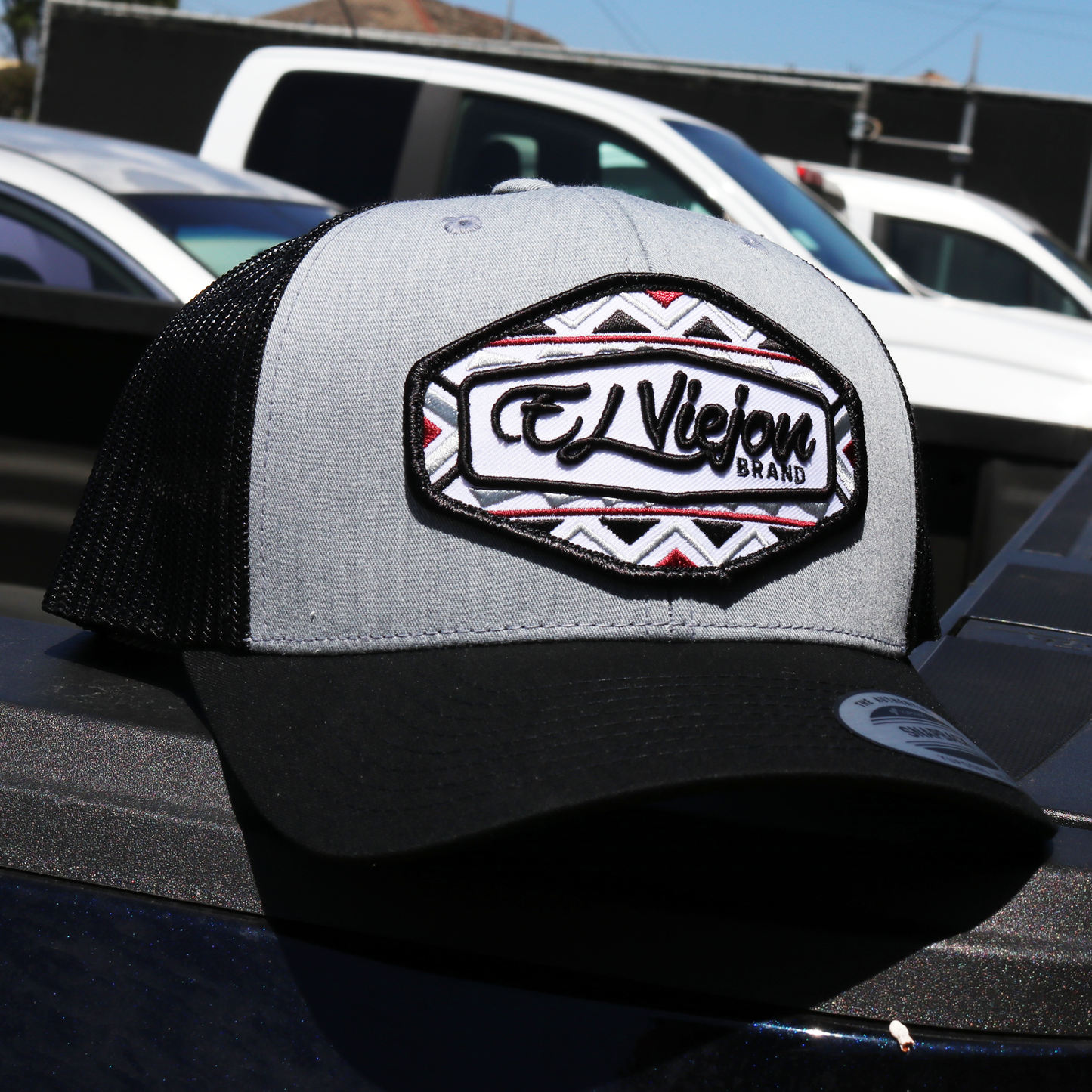 Dakota Black/Heather/Black Yupoong Classic trucker hat with "El Viejou Brand" patch.