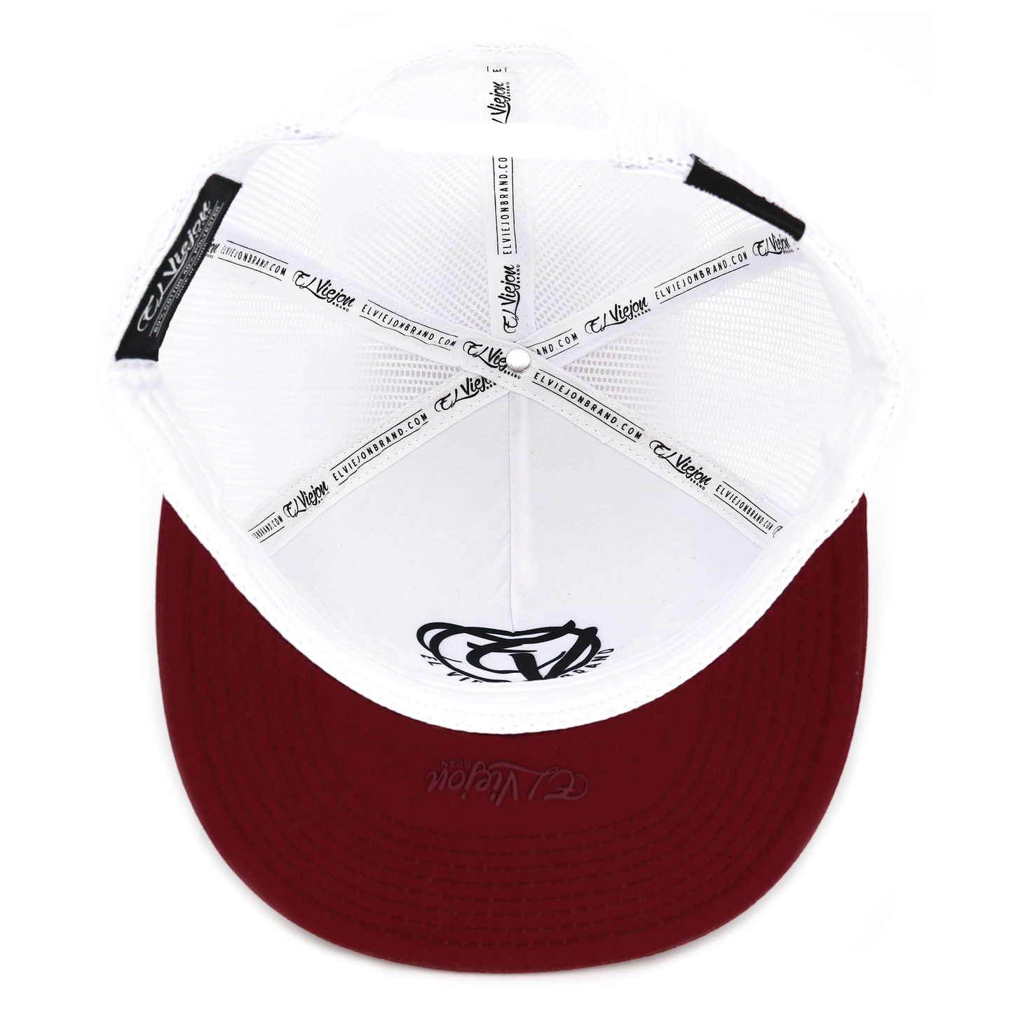 Inside view of a maroon and white flat visor hat with white mesh and adjustable snapback.