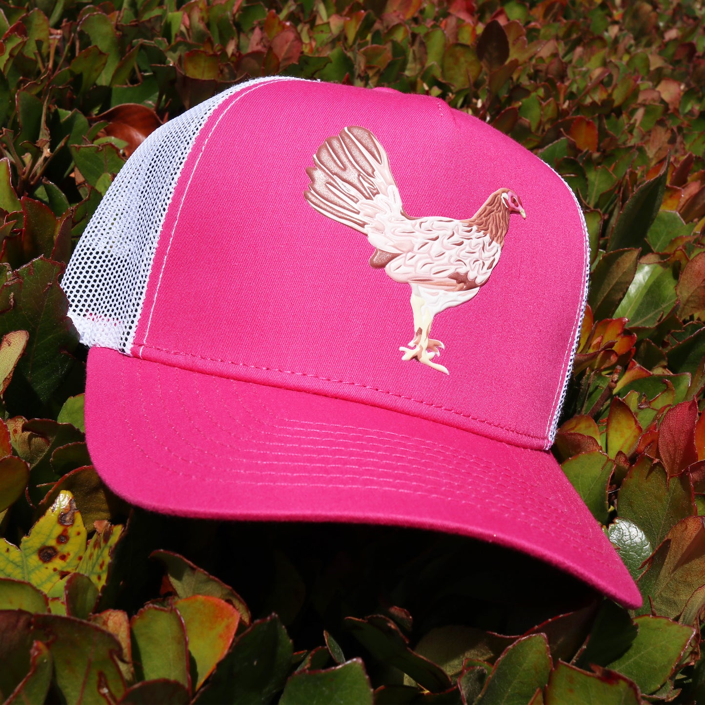 Pink and white mesh AVC hat with a brown chicken design, high profile, pre-curved visor, and snapback.