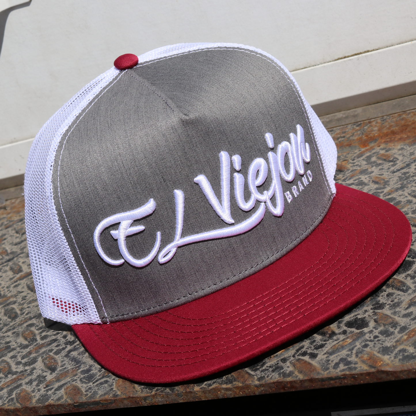 La Original Maroon/Heather/White flat visor hat with "El Viejon Brand" embroidered.
