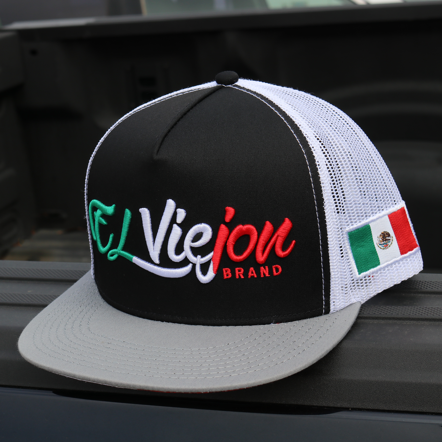 Tri Color Grey/Black/White flat visor hat with "El Viejon Brand" embroidered and a Mexican flag patch.