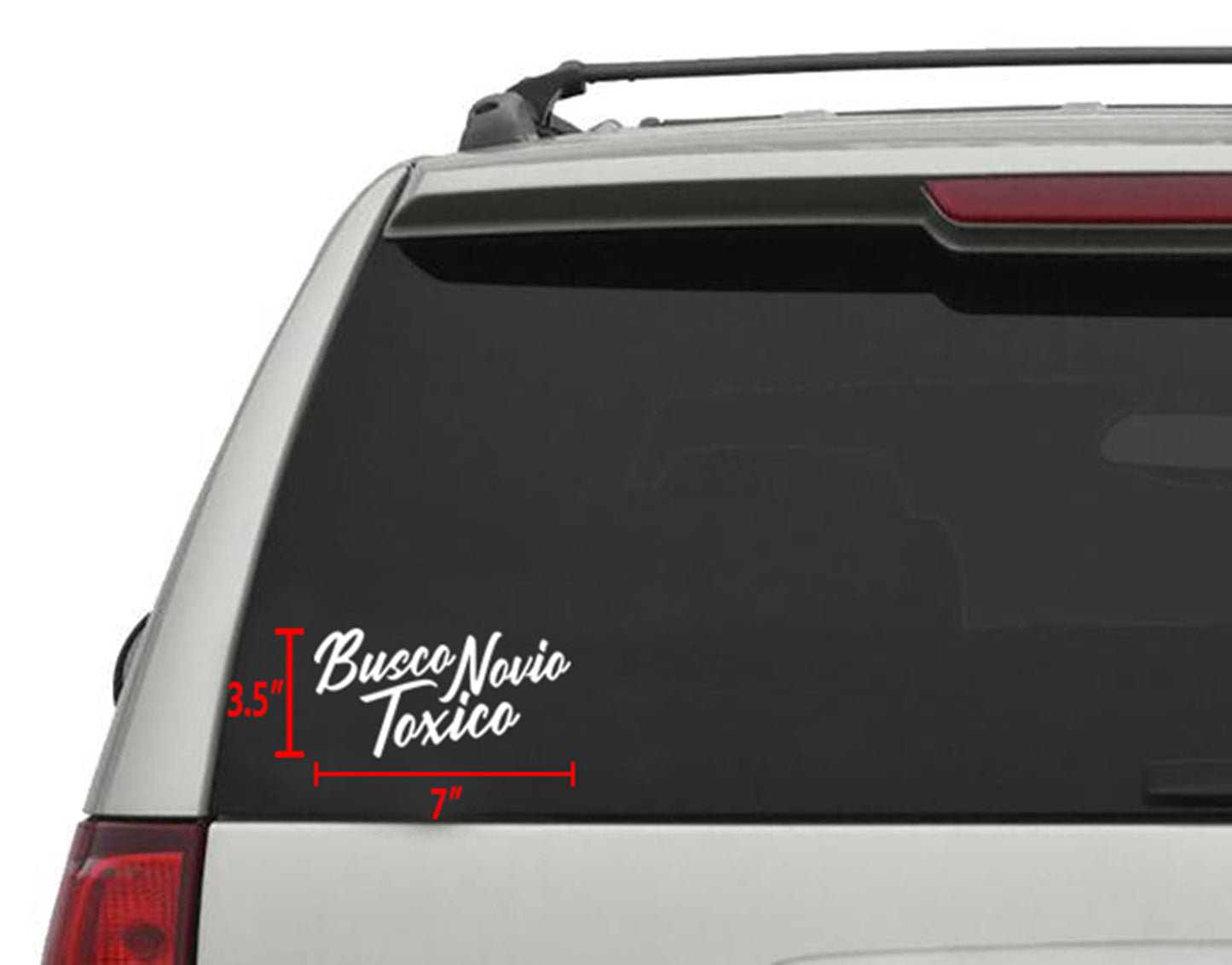 White "Busco Novio Toxico" die-cut vinyl sticker, 7"x 3.5", applied to a car's rear window.