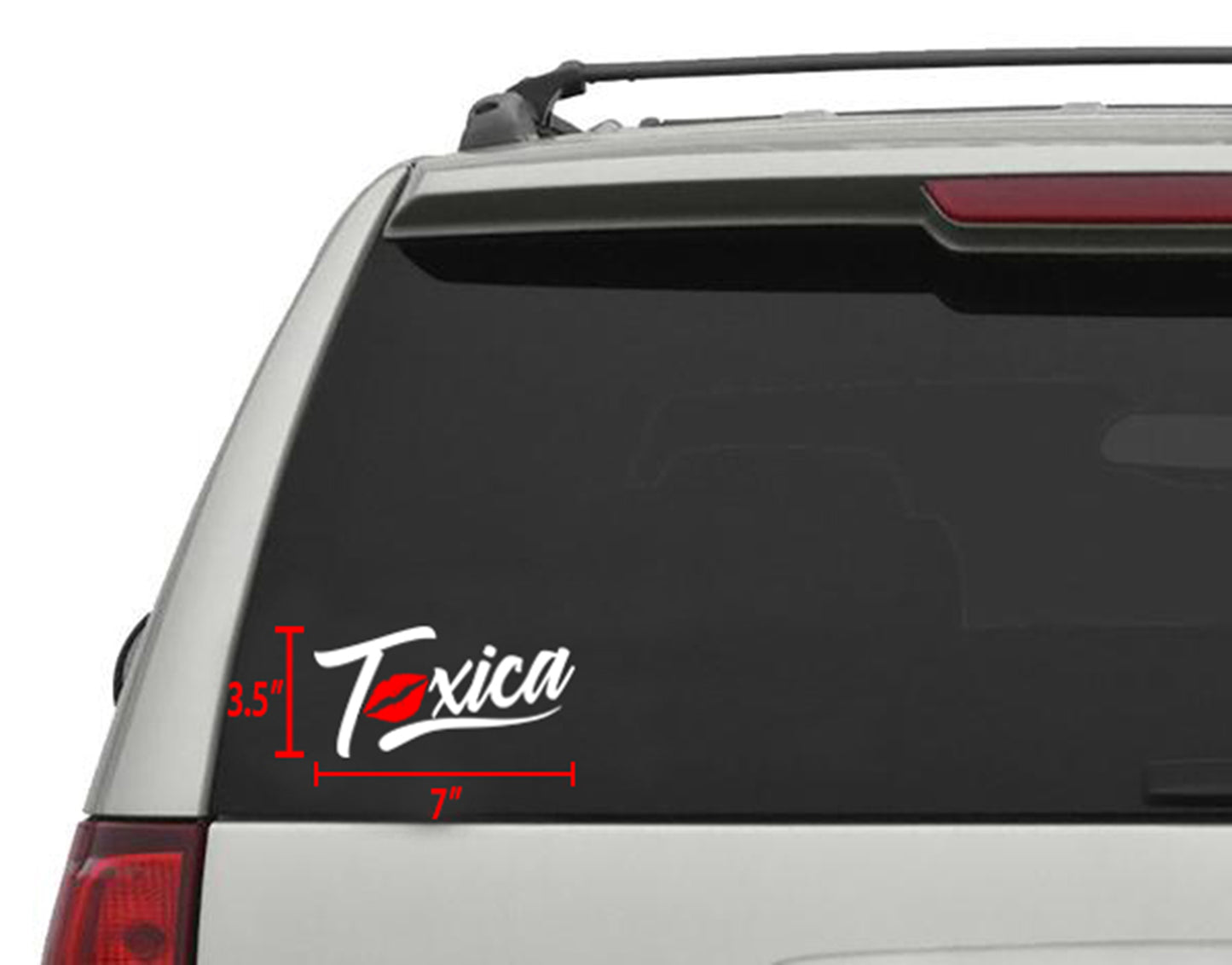 White "Toxica" die-cut sticker with red lips, 7"x3.5", applied to a vehicle's rear window.