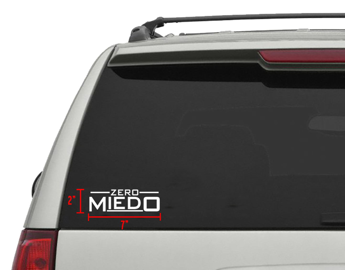 White "Zero Miedo" die-cut vinyl decal, 7"x 2", on a car's rear window.