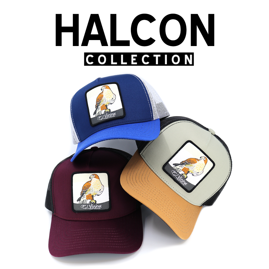 Three trucker hats from the Halcon Collection in blue, maroon, and tan, each with a falcon patch.