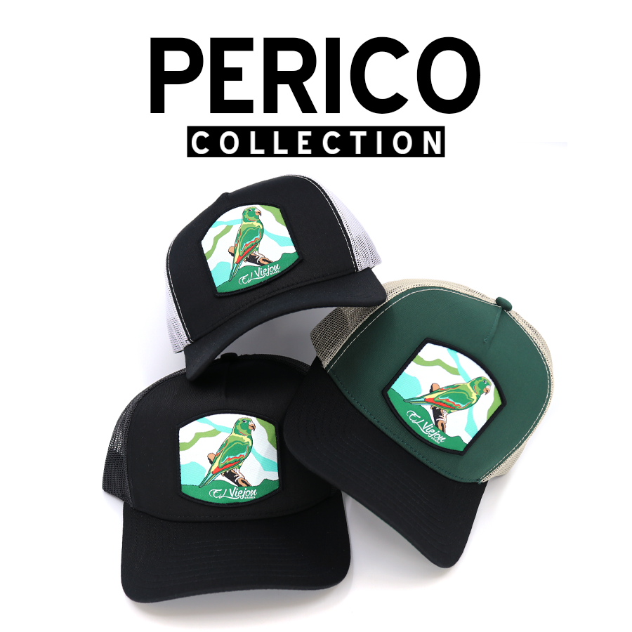 Perico Collection: Black and green trucker hats with vibrant parrot patches, featuring "El Viejo" script.