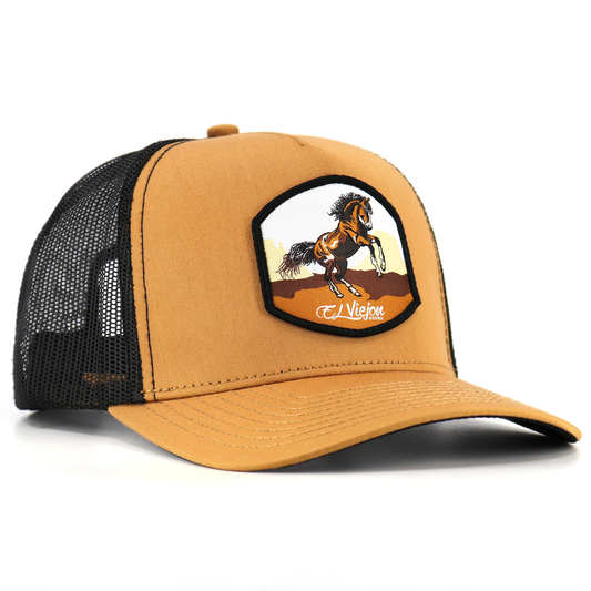 Bailador Caramel/Black AVC hat with a rearing horse patch, black mesh, and pre-curved visor.