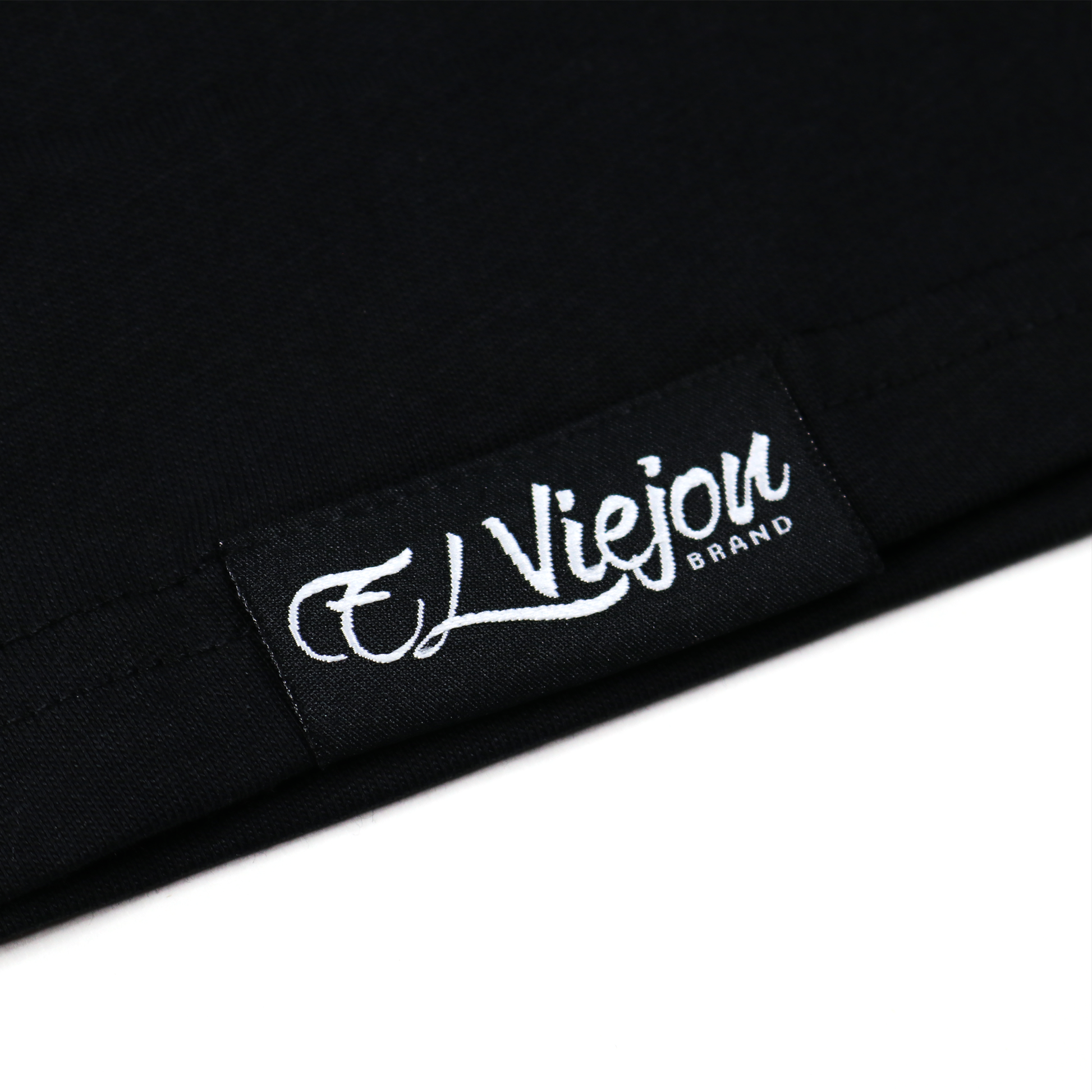 Black 100% cotton Rancho Viejo shirt with white embroidered brand tag.