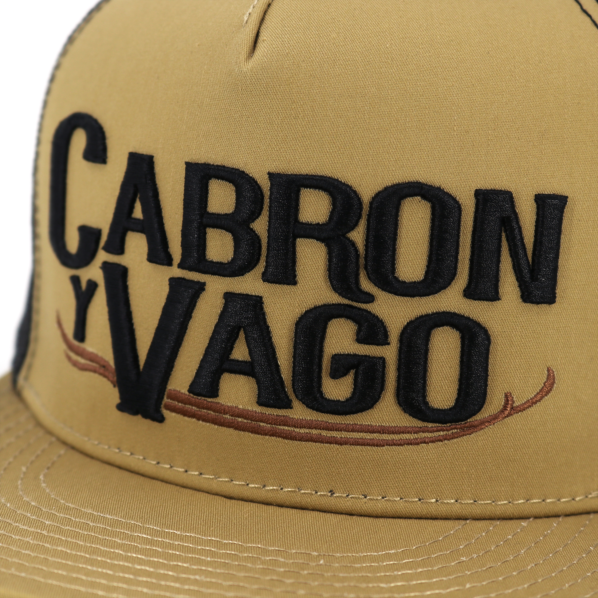 Cabron Y Vago mocha/black flat visor hat with embroidered logo and mesh back.