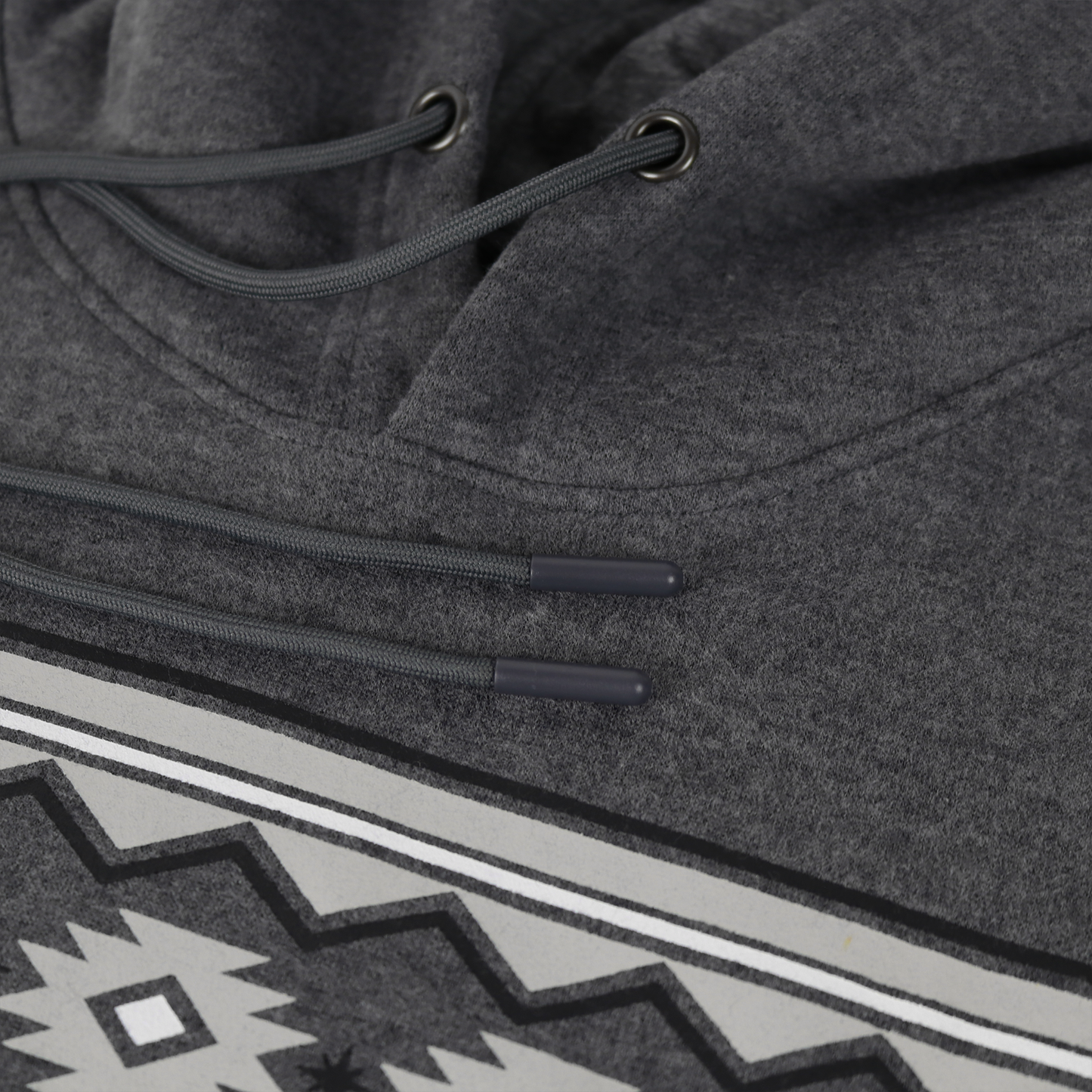 Dark heather grey cotton/poly fleece hoodie with drawstring hood and screen-printed geometric design.
