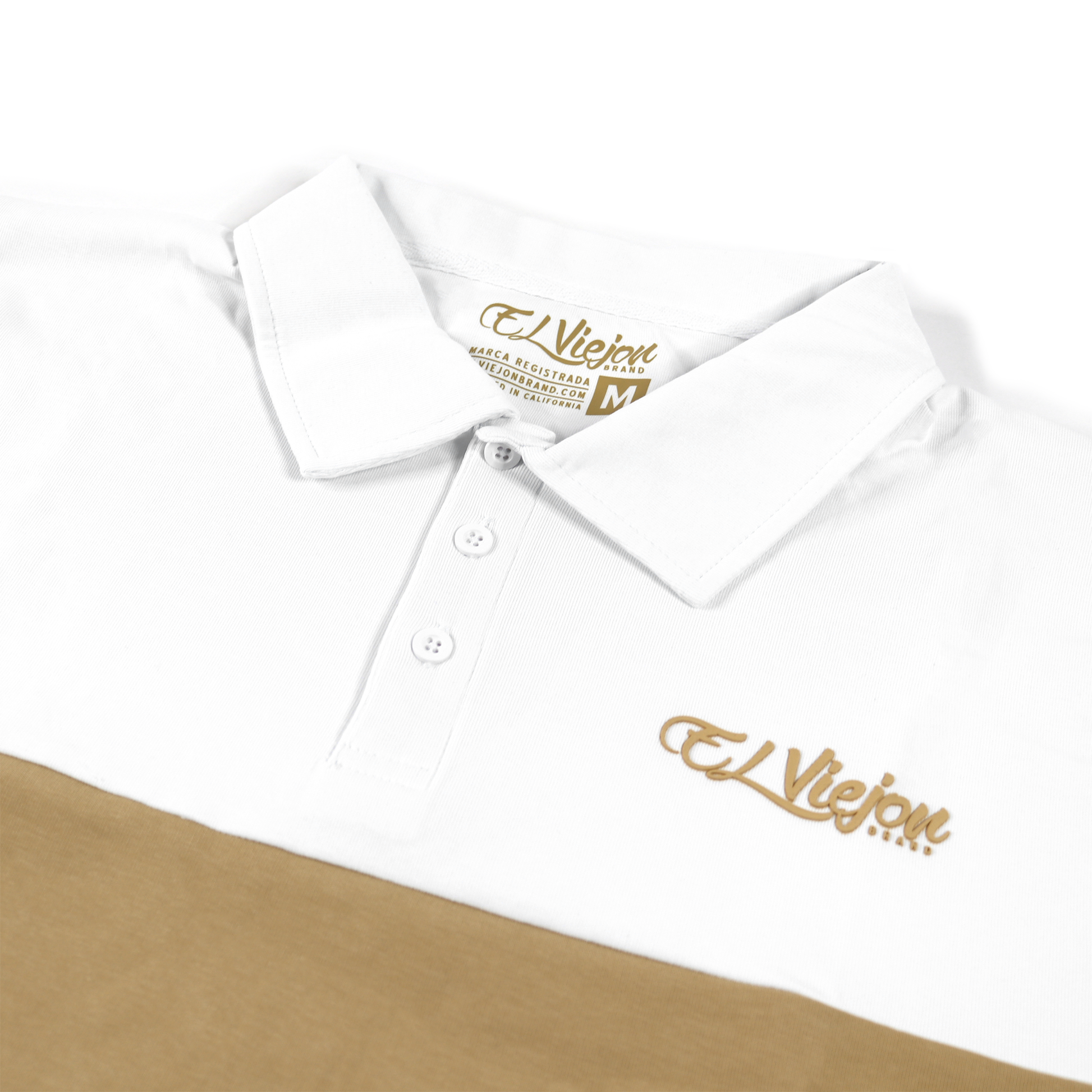 White and sand two-tone polo shirt with 3-button placket and gold "El Viejon Brand" logo.