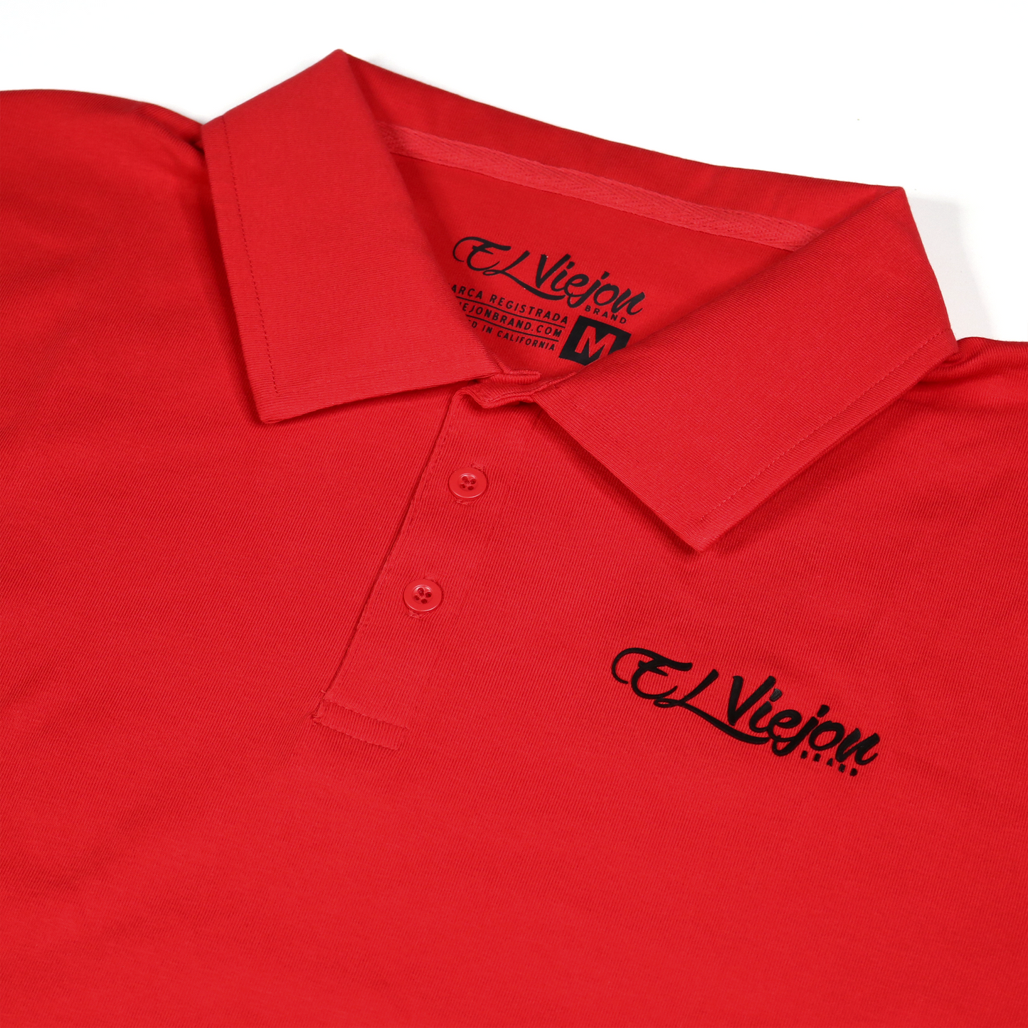 Red El Viejon Brand polo shirt, 96% cotton/4% spandex, with a 3-button placket and black 3D logo.