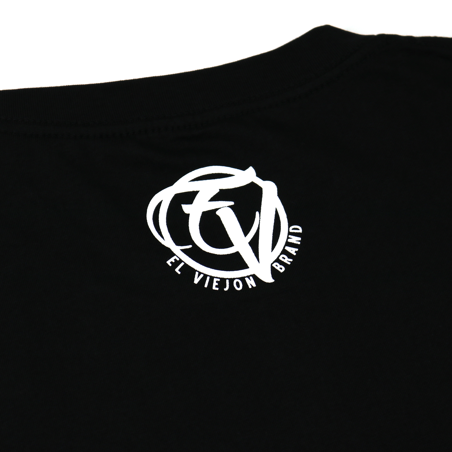 Black Euro Shirt with white "EL VIEJON BRAND" screen-printed logo on the back, 100% cotton.