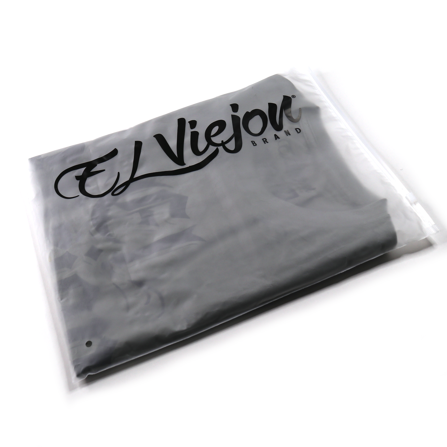 Folded charcoal Medieval shirt in clear plastic packaging with "El Viejon Brand" logo.