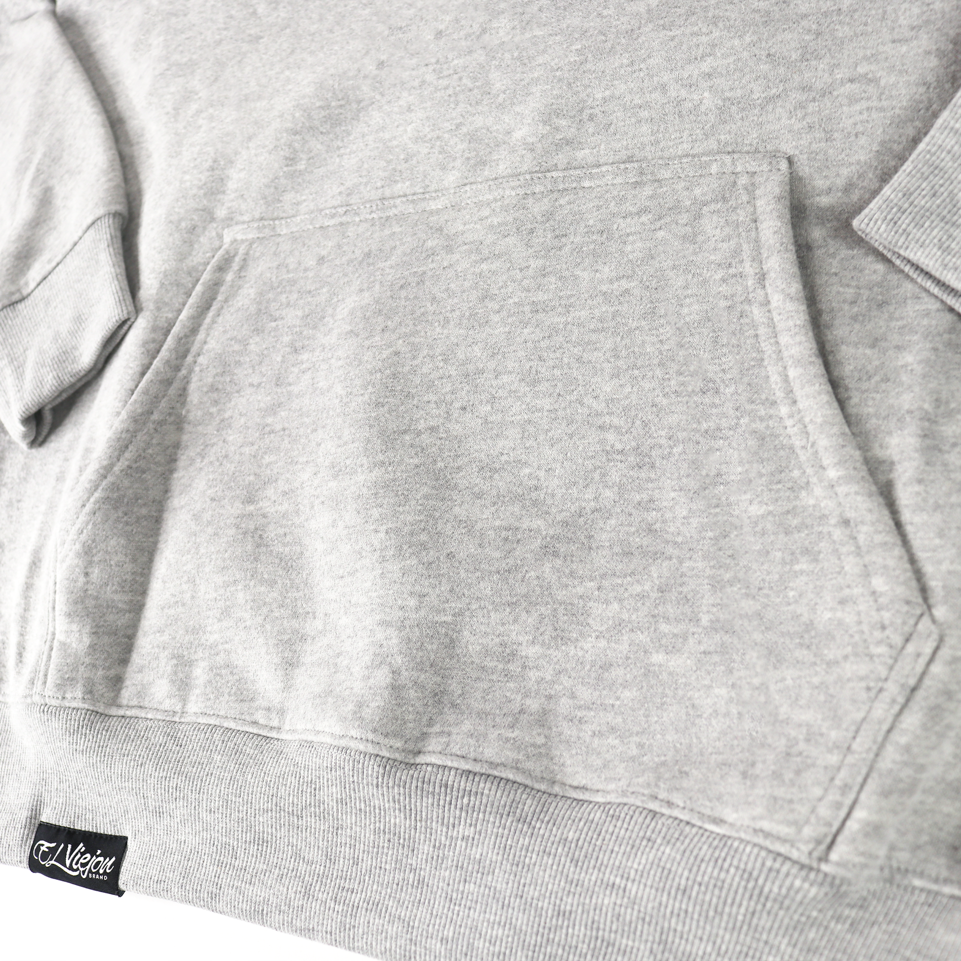 Origen heather cotton/poly fleece hoodie with front pocket and "El Viejon" logo tag.