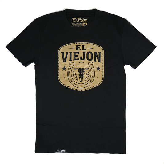 Black Rancho Viejo 100% cotton t-shirt with a distressed gold "El Viejon" logo featuring a bull skull and horseshoe.