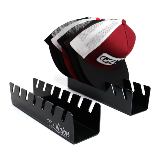 Black glossy acrylic hat organizers, one holding multiple hats, with 7 slots each.
