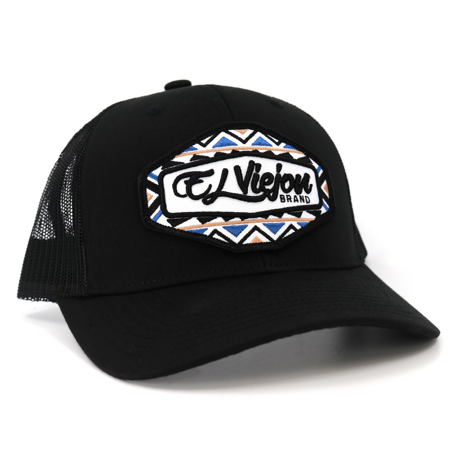 Black TruCap trucker hat with mesh back, pre-curved visor, and "El Viejou Brand" patch with geometric pattern.