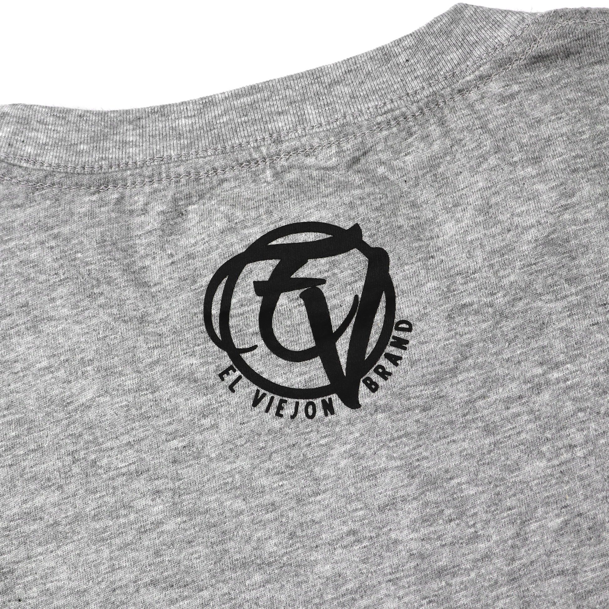 Alpha Shirt Heather, 100% algodón, con logo serigrafiado negro "EL VIEJON BRAND" en la parte trasera.