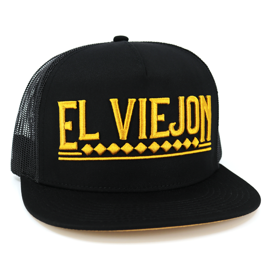 Apache Black flat visor hat with "EL VIEJON" embroidered in gold, black mesh back, adjustable snapback.