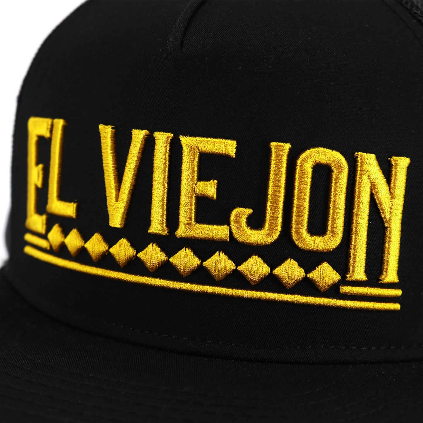 Apache Black flat visor hat with "EL VIEJON" embroidered in gold, 5-panel design.
