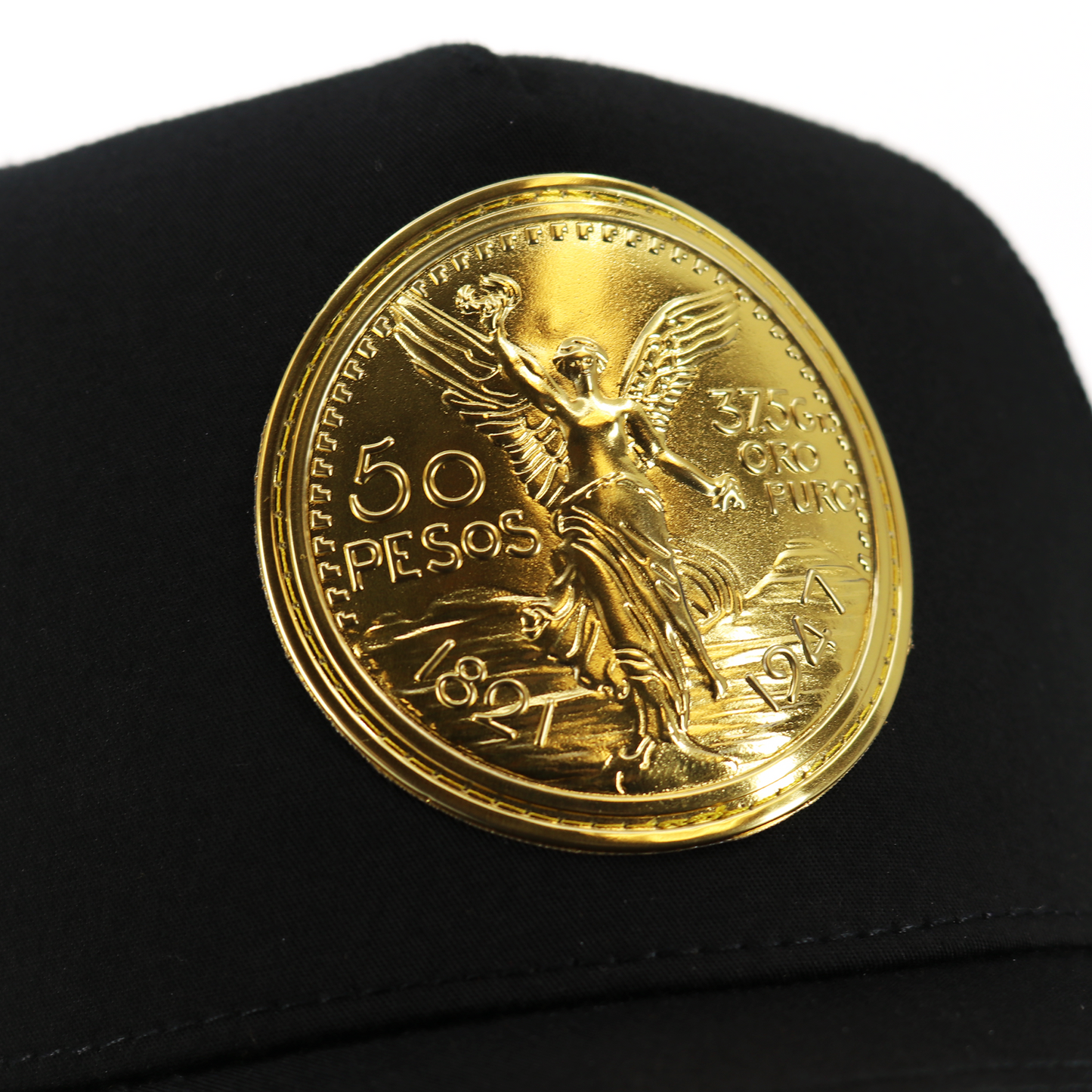 El Cente Black AVC hat with a gold 50 Pesos coin emblem.