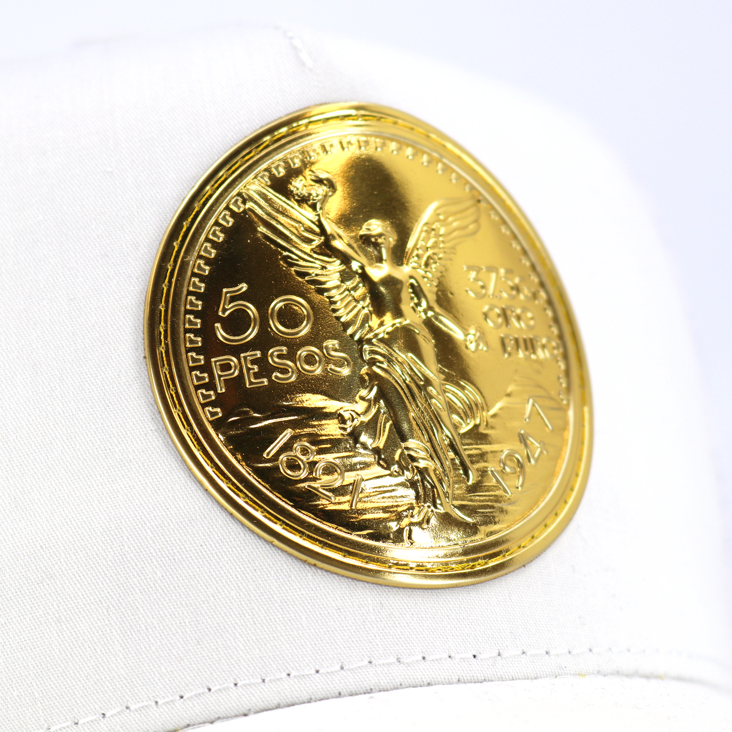 El Cente White AVC hat with a prominent gold 50 Pesos coin emblem.