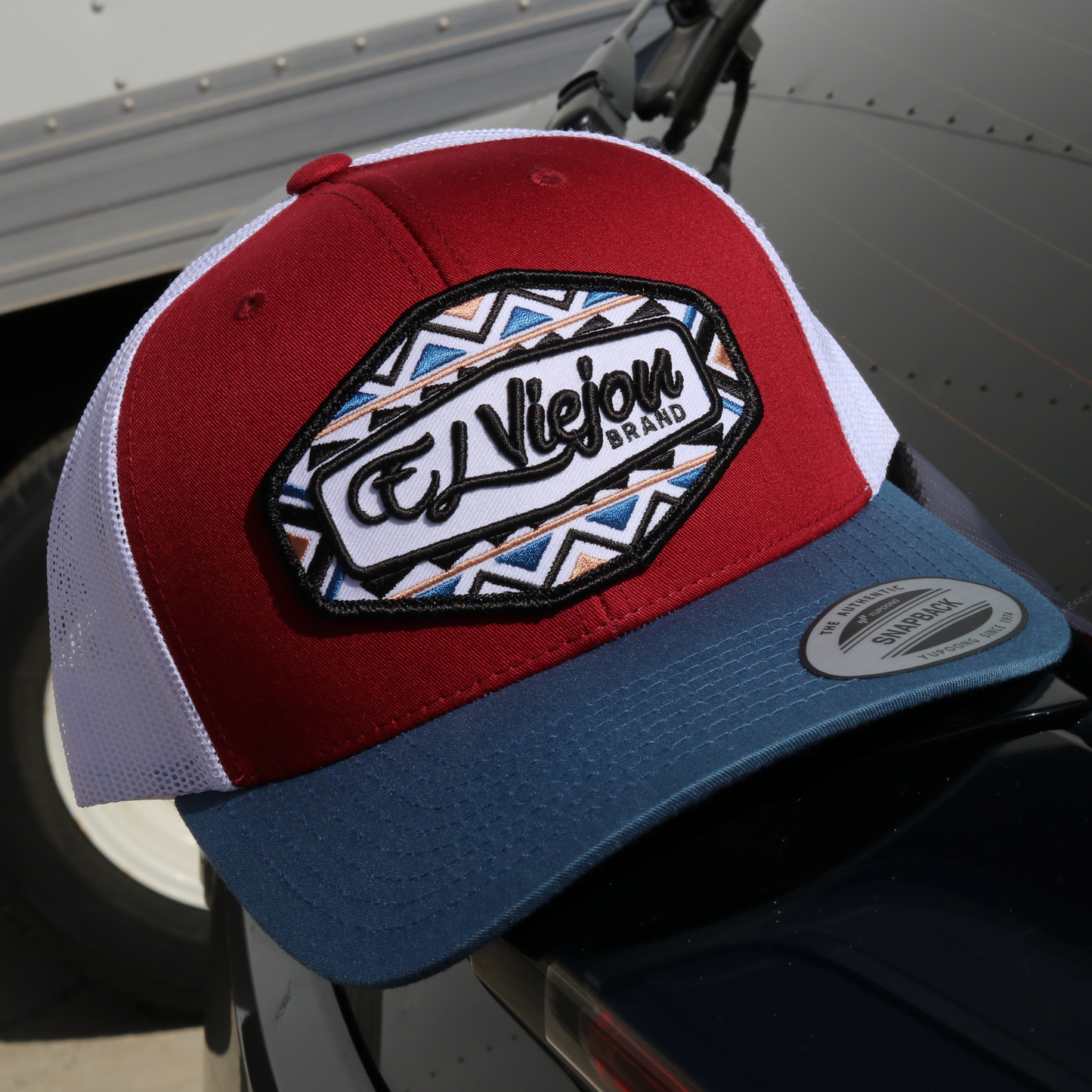 Dakota Indigo/Maroon/White Yupoong Classic trucker hat with "El Viejon Brand" patch.