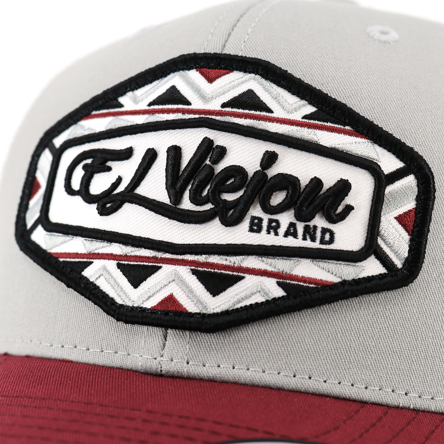 Dakota Maroon/Silver/White Yupoong Classic trucker hat with "El Viejon Brand" embroidered patch.