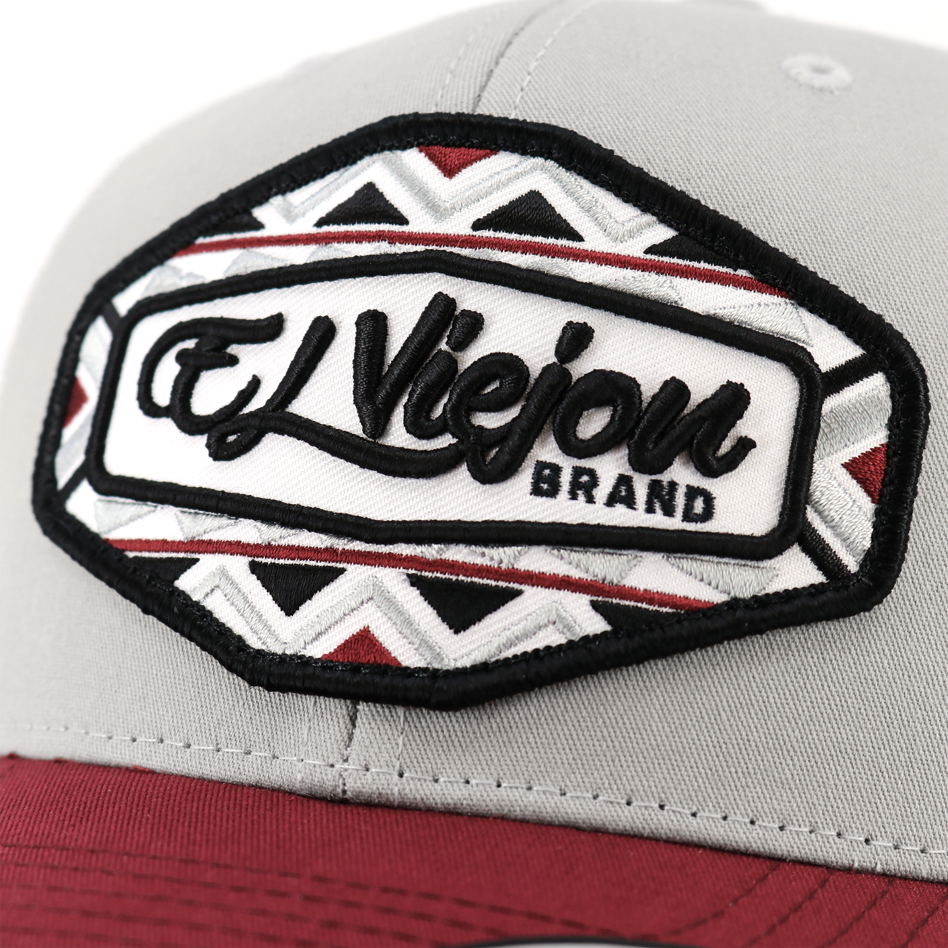 Dakota Maroon/Silver/White Yupoong Classic trucker hat with "El Viejon Brand" embroidered patch.