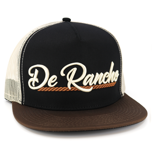 De Rancho brown, black, and cream flat visor hat with embroidered logo and mesh back.