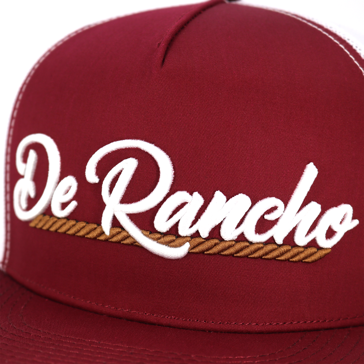 De Rancho maroon flat visor hat with white mesh back and embroidered logo.