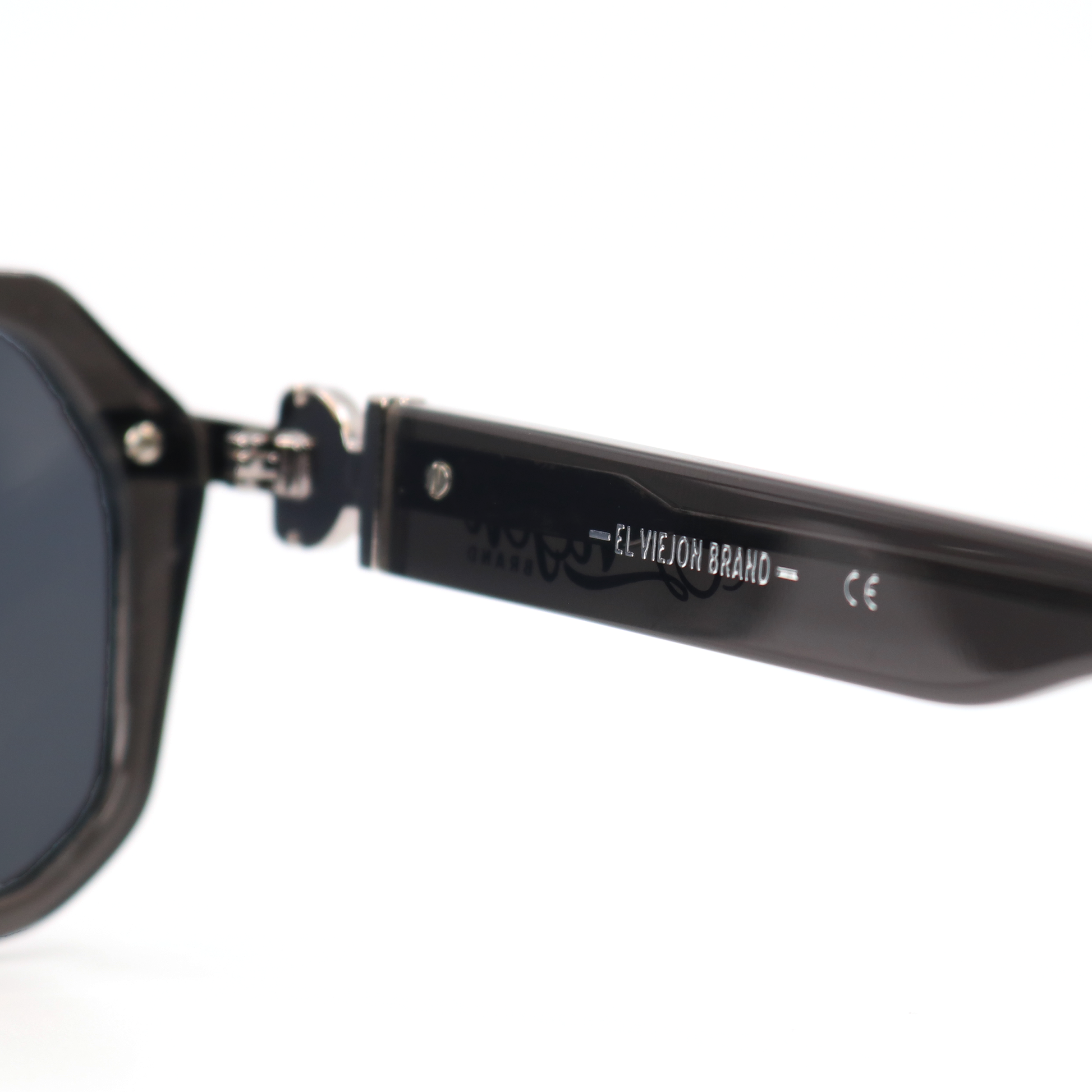Close-up of El Viejon Brand Emperador Grey sunglasses with acetate frame and polarized lenses.