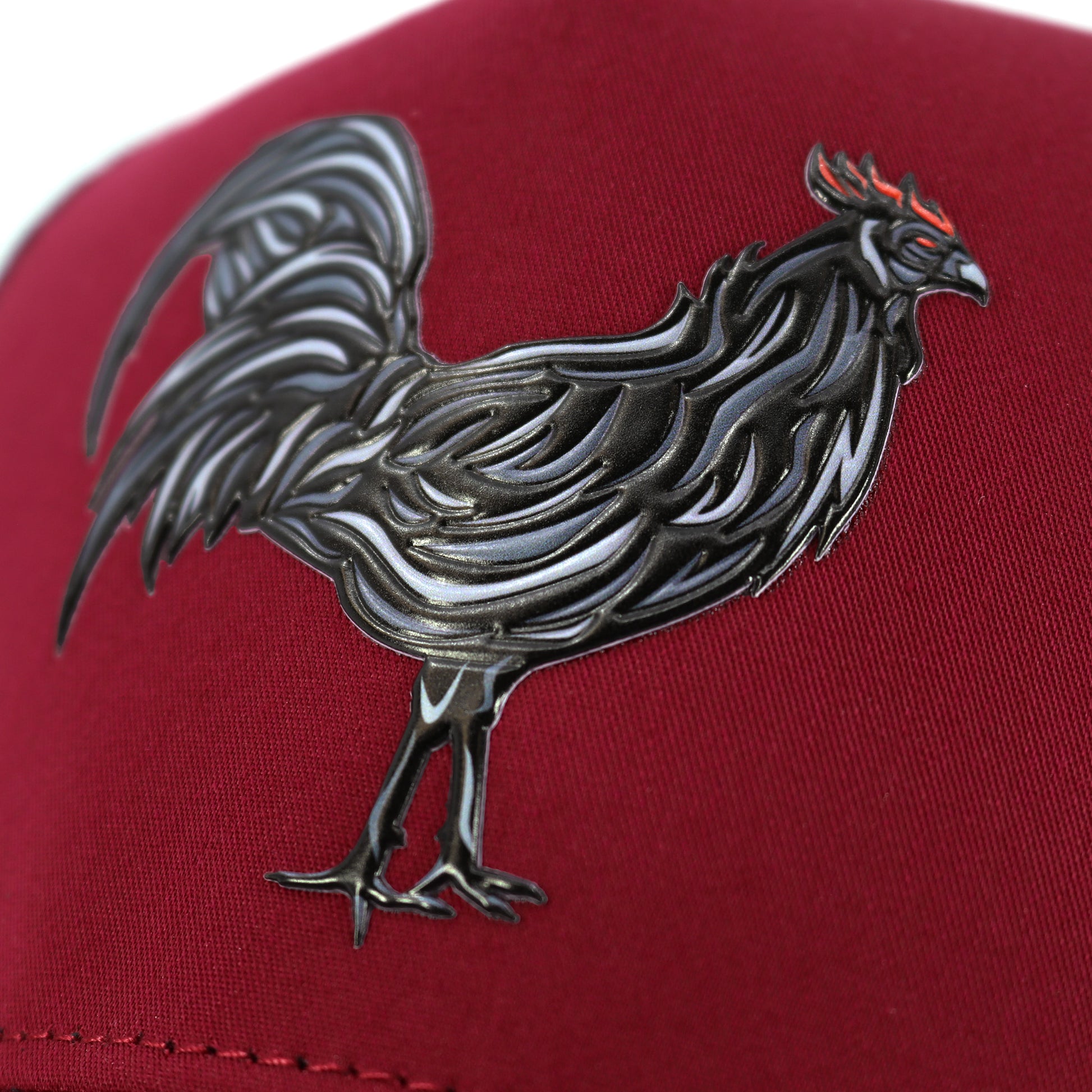 Gallo Negro maroon/black AVC hat with a black rooster emblem and red accents.