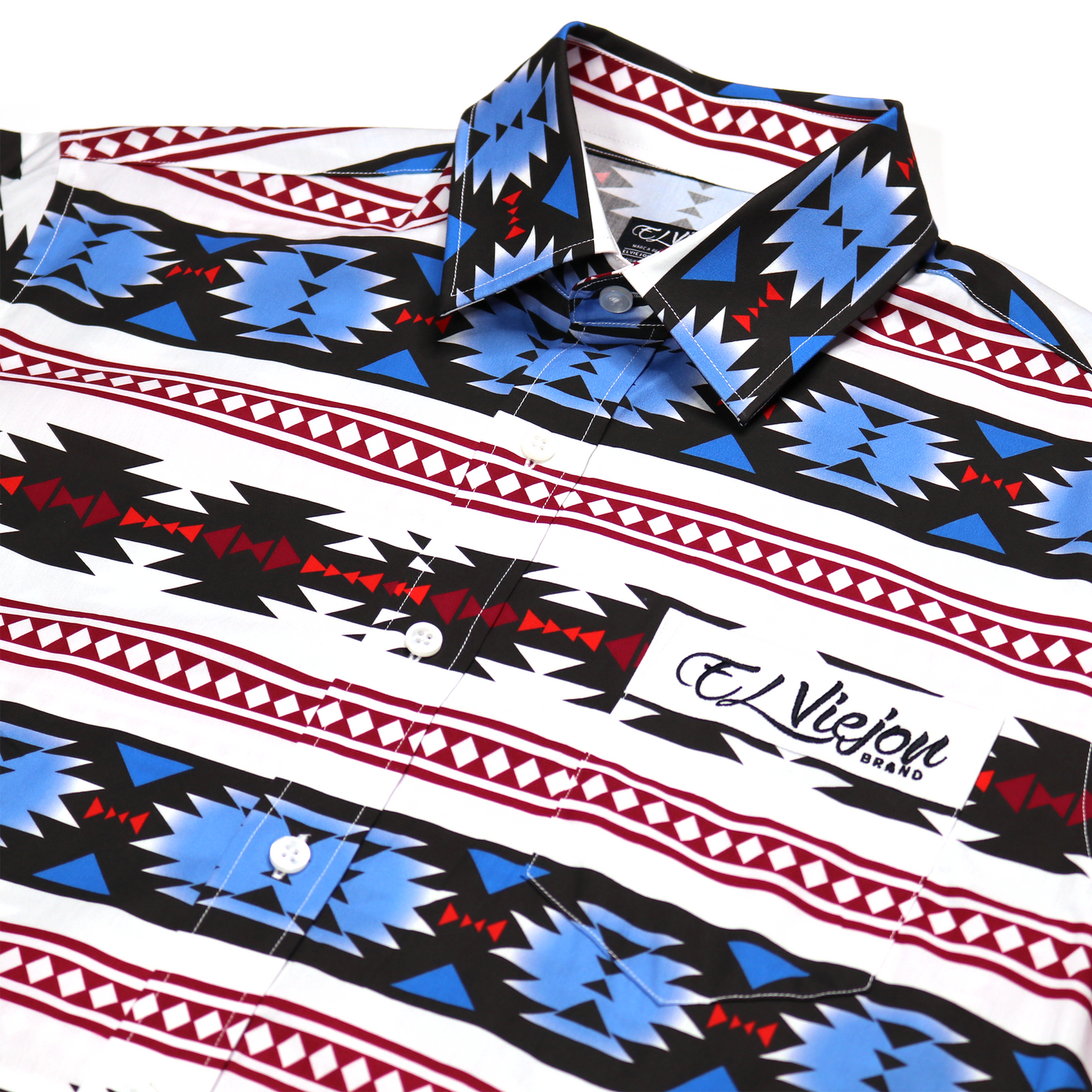 Lakota White dress shirt with blue, black, and red geometric pattern, straight collar, and El Viejon Brand logo.