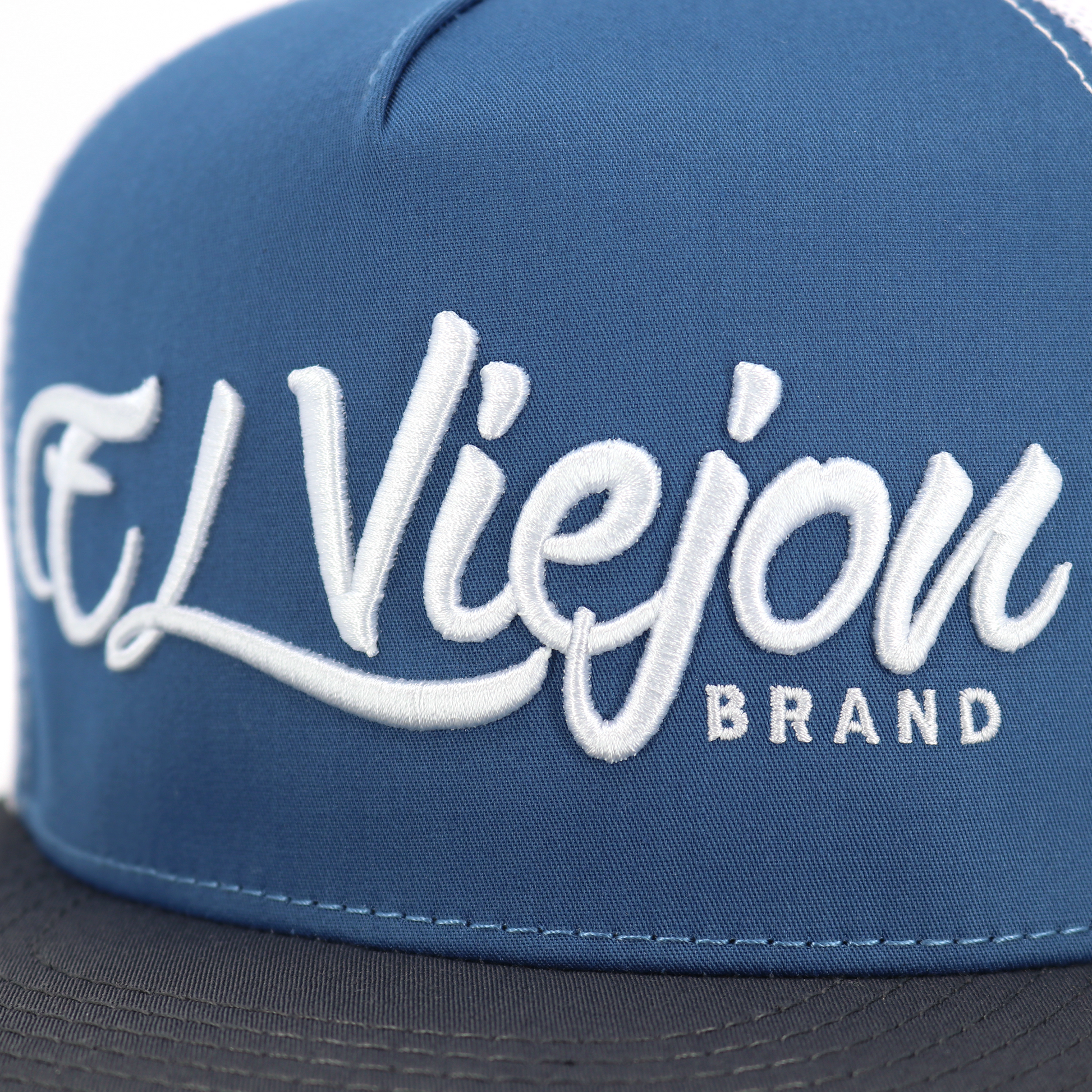 La Original Charcoal/Indigo/White flat visor hat with "El Viejon Brand" embroidered in white.