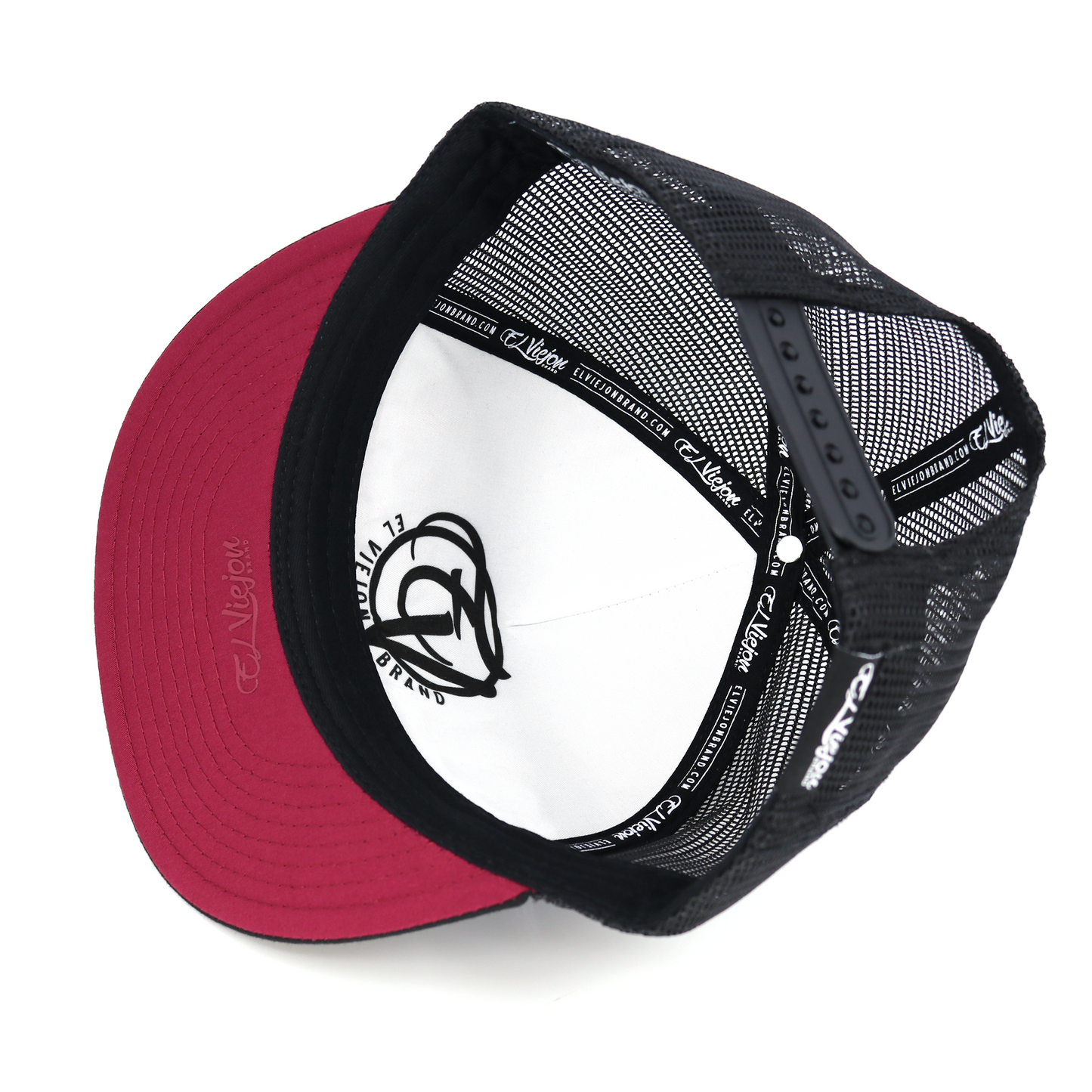La Original Black flat visor hat with black mesh, red underbrim, and white front panel with logo.