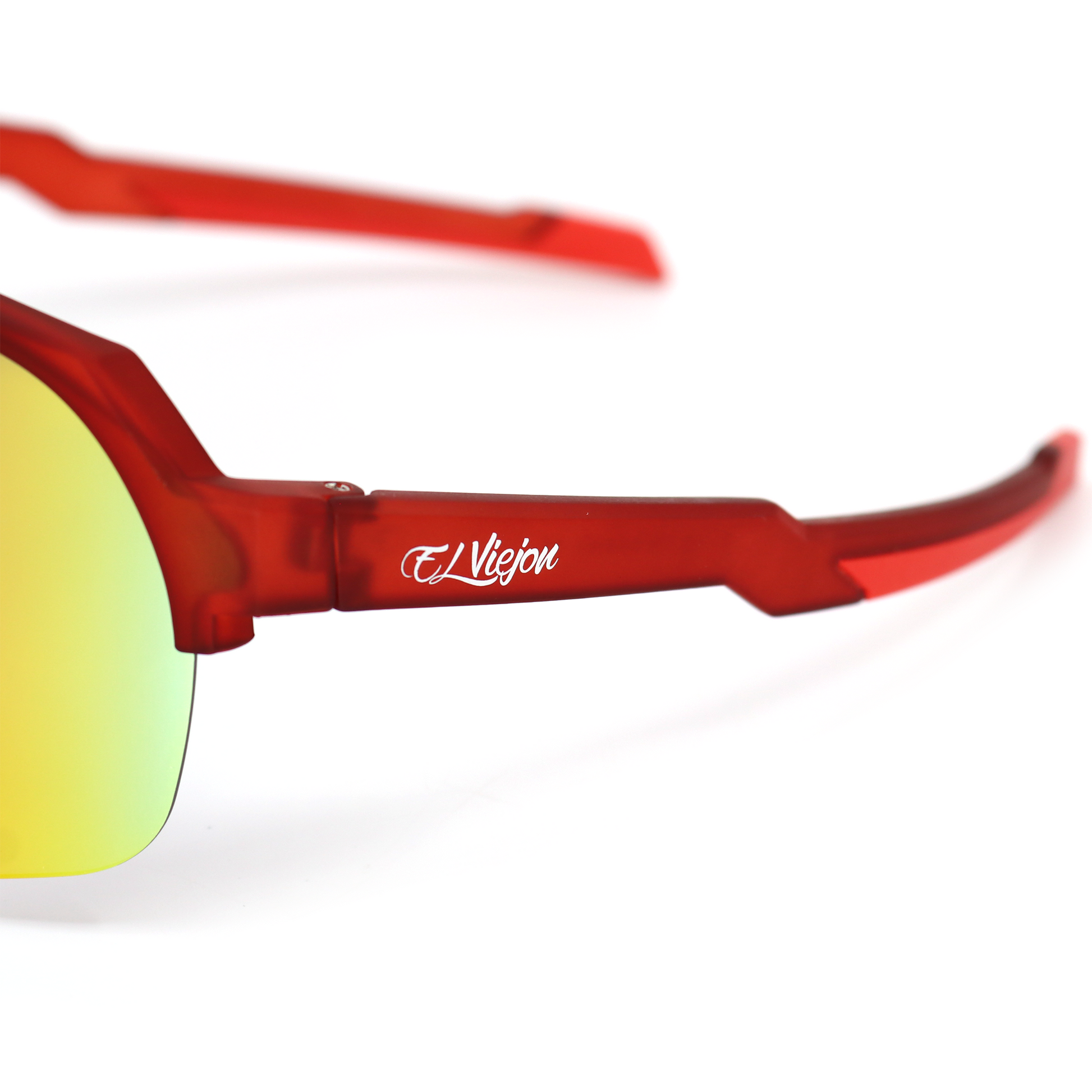 Red El Viejon Brand Magna sport sunglasses with yellow-orange color-changing lenses and TR frame.