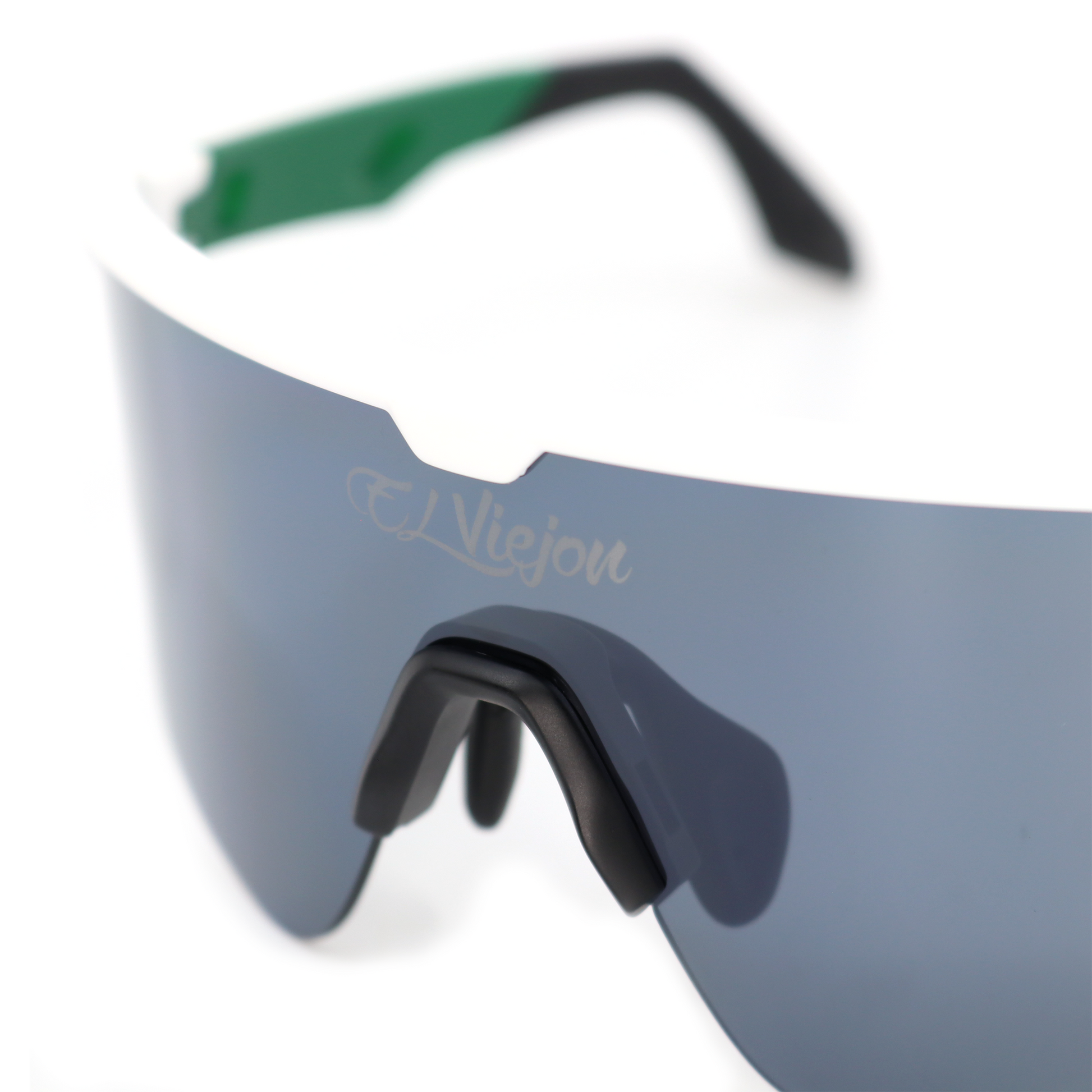 White El Viejon Brand Mex sport sunglasses with gray UV400 lens, black adjustable nose pad, and green temple accent.