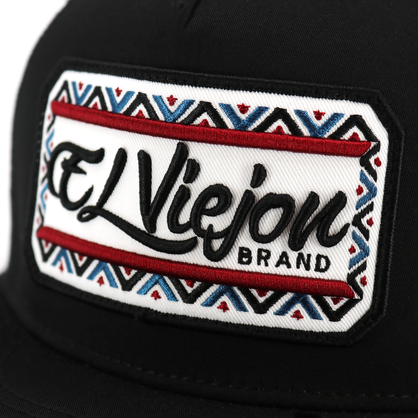 Nayarit Black flat visor hat with "El Viejon Brand" embroidered patch, tribal pattern, red and blue accents.