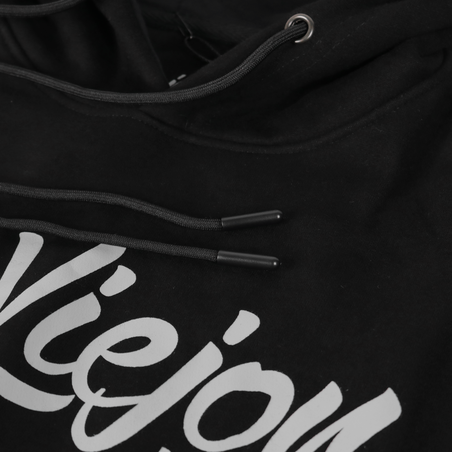 Black cotton/poly fleece hoodie with white "Viejo" screen-printed logo and drawstring hood.