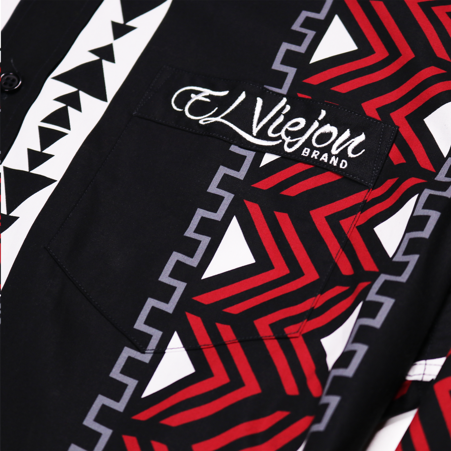 Phoenix Black dress shirt with red, white, and gray geometric patterns, front pocket, and "El Viejon Brand" logo.