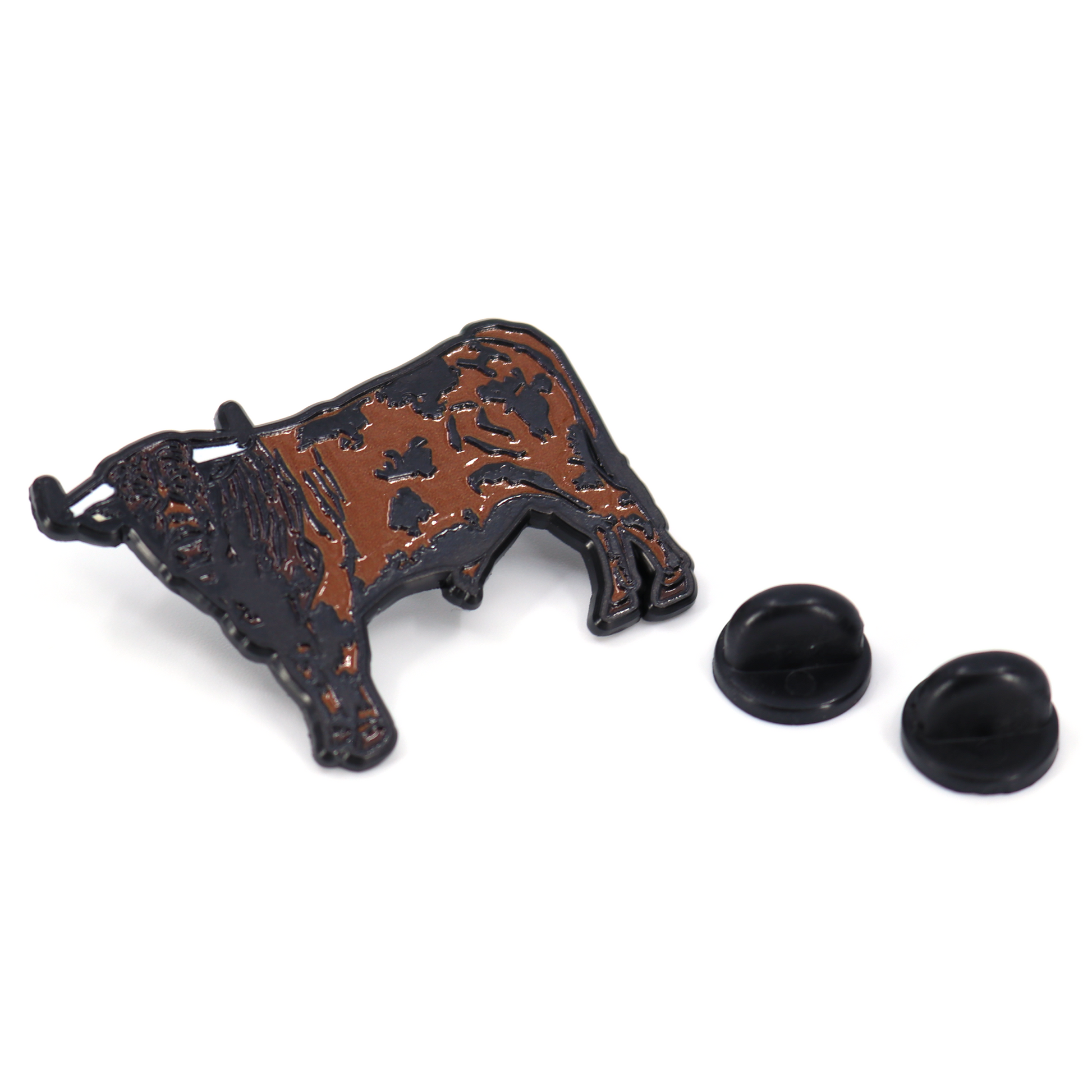 Semental Pin de esmalte negro y café con diseño de toro, incluye clutch de goma.
