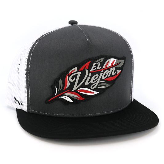Poblador black/charcoal/white flat visor hat with "El Viejon" feather logo and white mesh back.