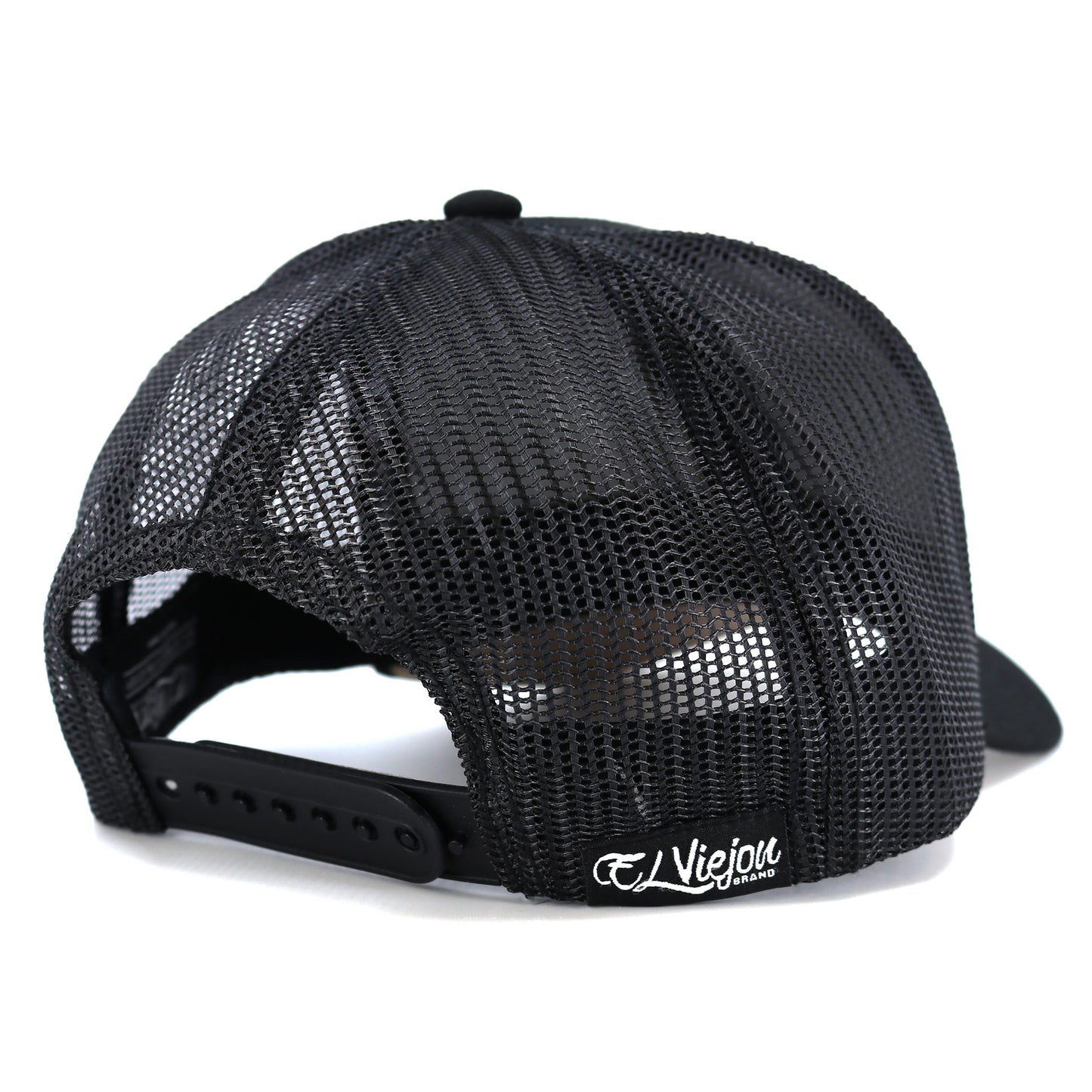 Pollito Black kids' trucker hat with mesh back, curved visor, and adjustable snapback.