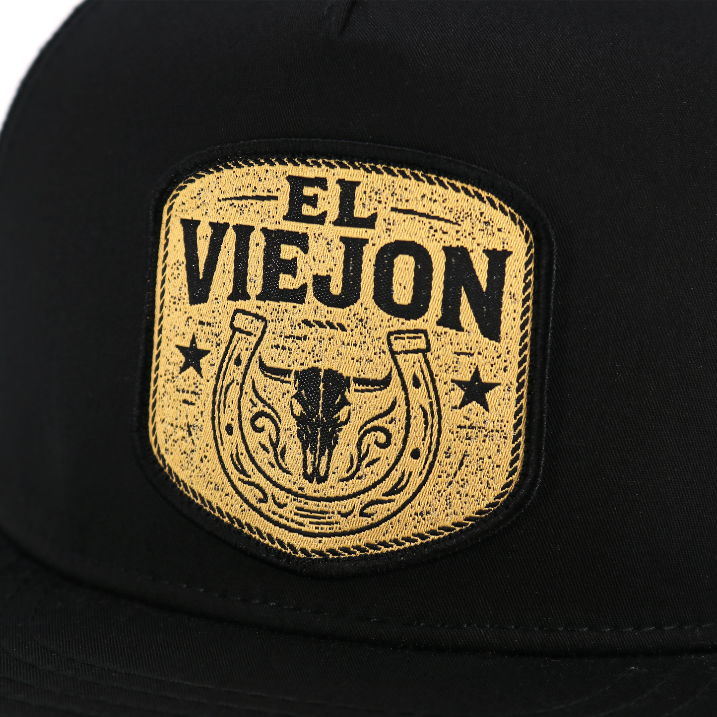 Rancho Viejo Black flat visor hat with gold "El Viejon" patch, bull skull, and horseshoe design.