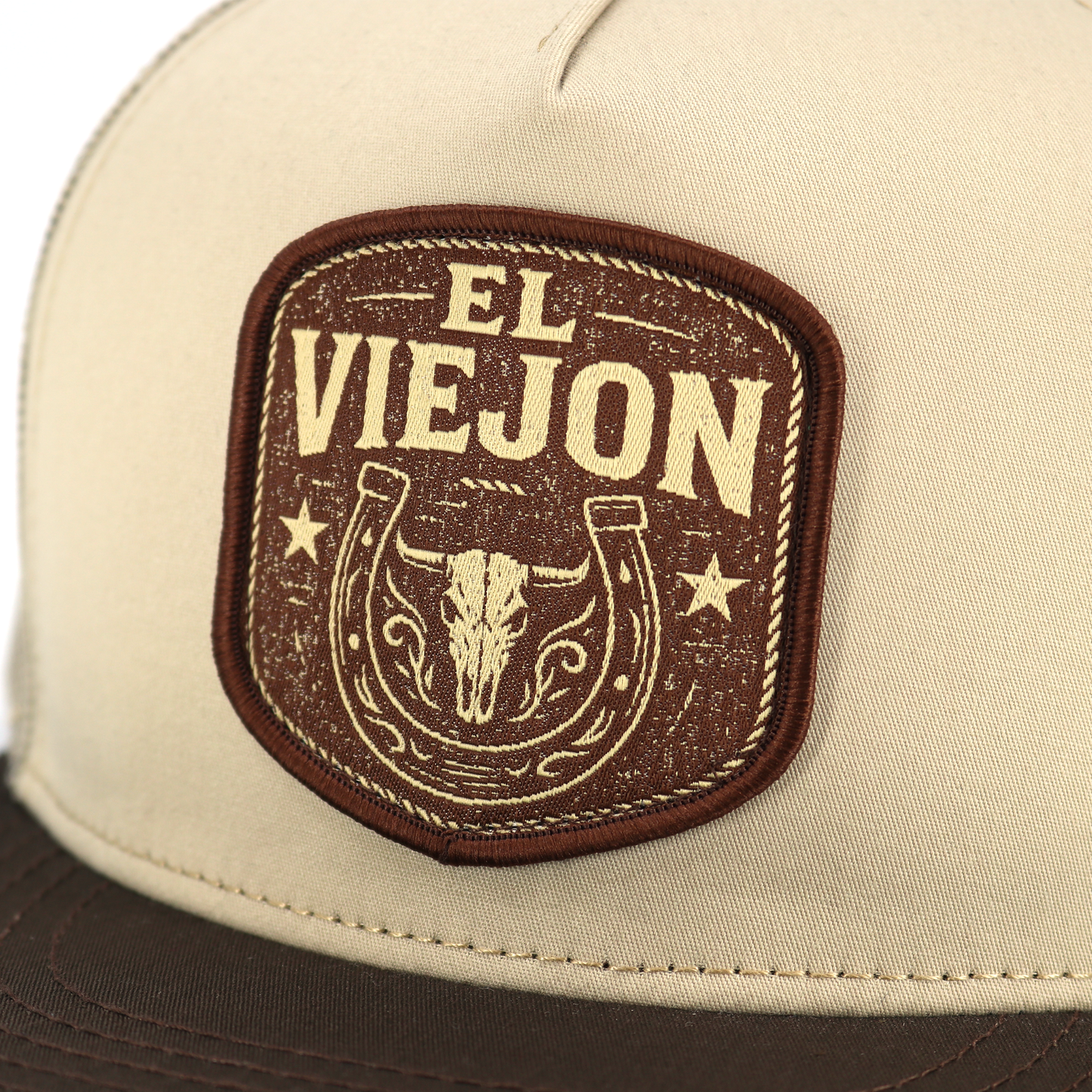 Rancho Viejo El Viejon brown/khaki flat visor hat with bull skull and horseshoe patch.