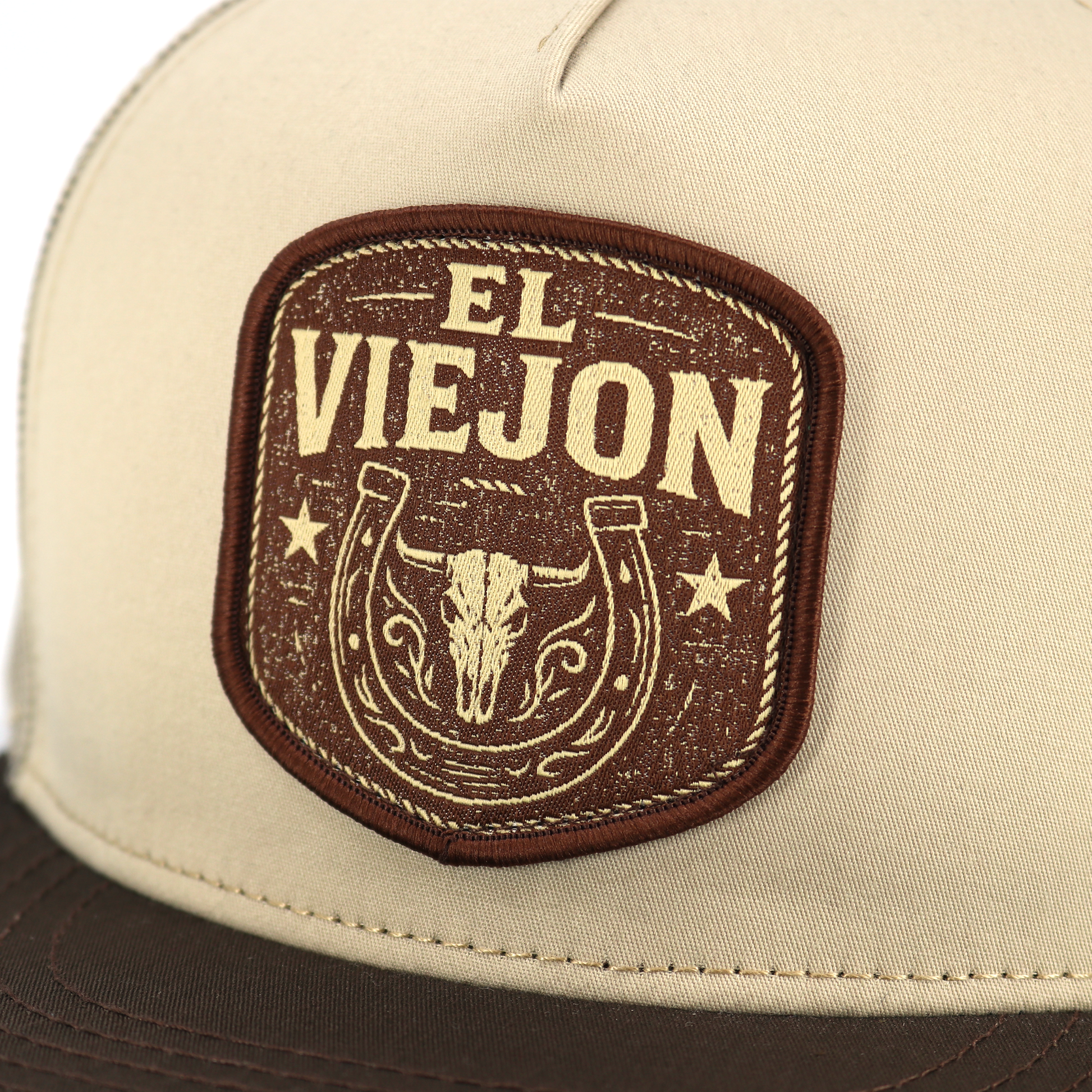 Rancho Viejo El Viejon brown/khaki flat visor hat with bull skull and horseshoe patch.