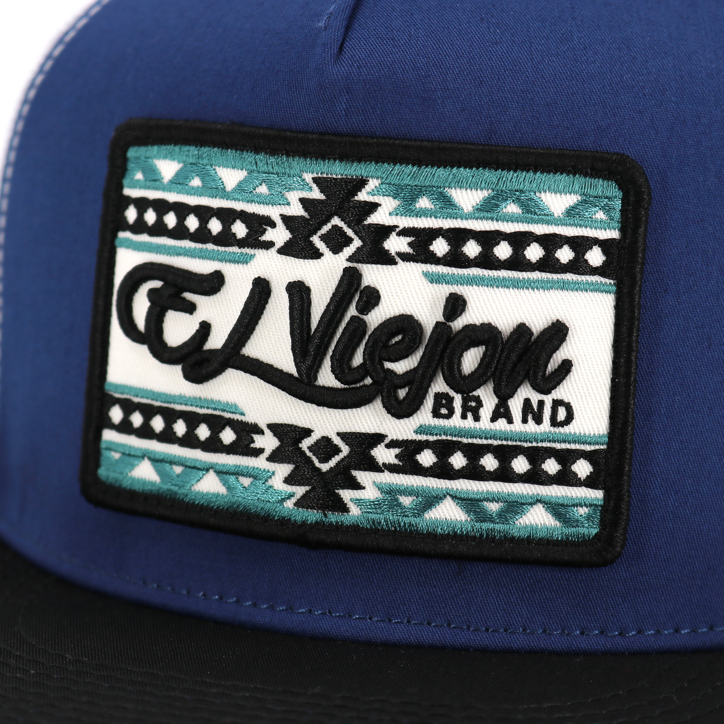 Sonoma Black/Navy/White flat visor hat with "El Viejon Brand" patch and tribal pattern.